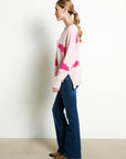 RIA 20 Oversized V-neck cashmere sweater with cloud print in baby pink /Indian pink