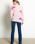 RIA 20 Oversized V-neck cashmere sweater with cloud print in baby pink /Indian pink