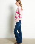 RIA 20 Oversized V-neck cashmere sweater with cloud print in baby pink /Indian pink